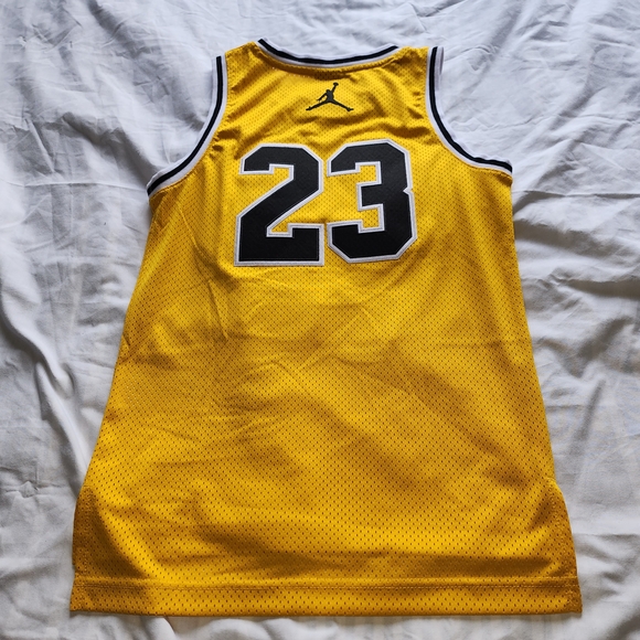 yellow and black jordan 23